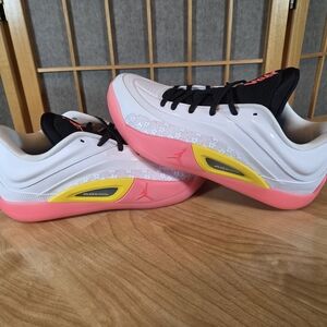 Air Jordan White and Pink Athletic Sneakers